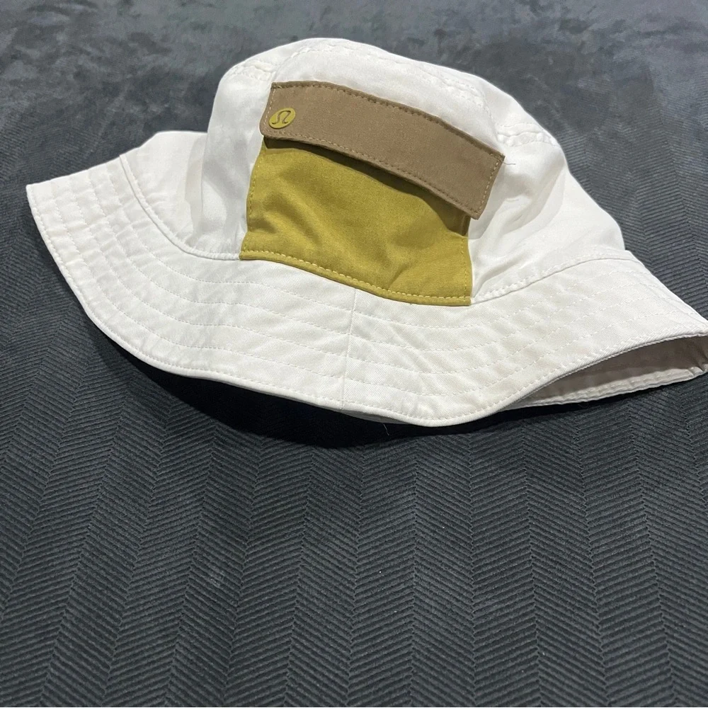 lululemon athletica women’s White Bucket Hat with Olive Pocket and Tan Trim